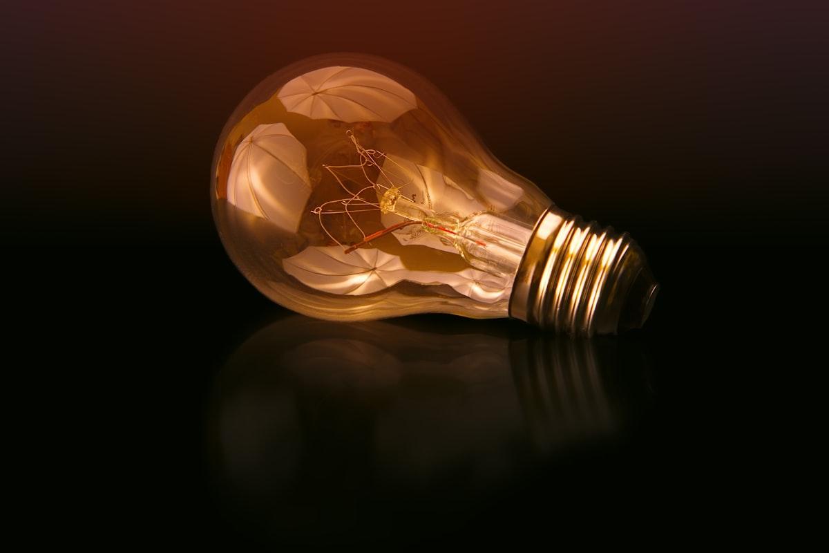 Warm-white glowing incandescent-style light bulb