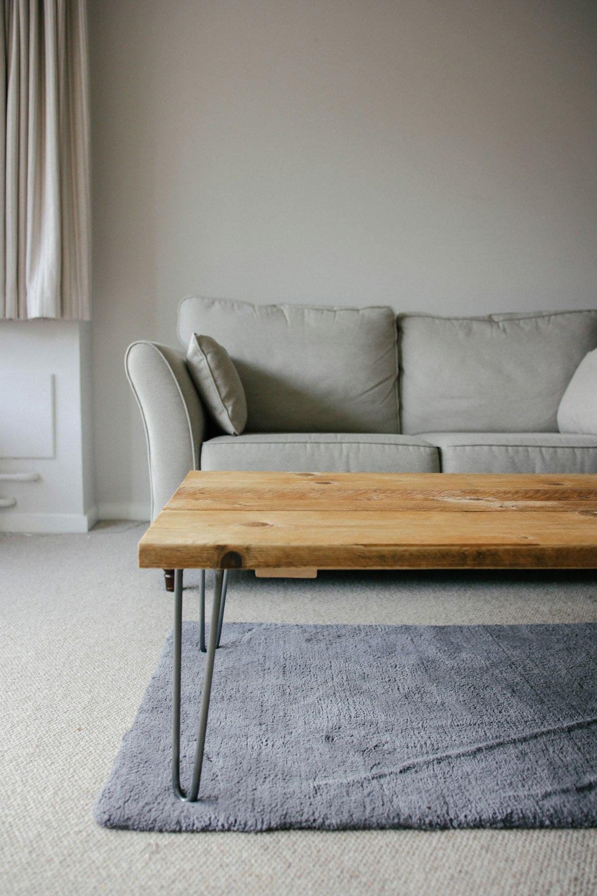 Light wood coffee table in a bright, minimal living room